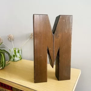 Solid wood lock letter M front view